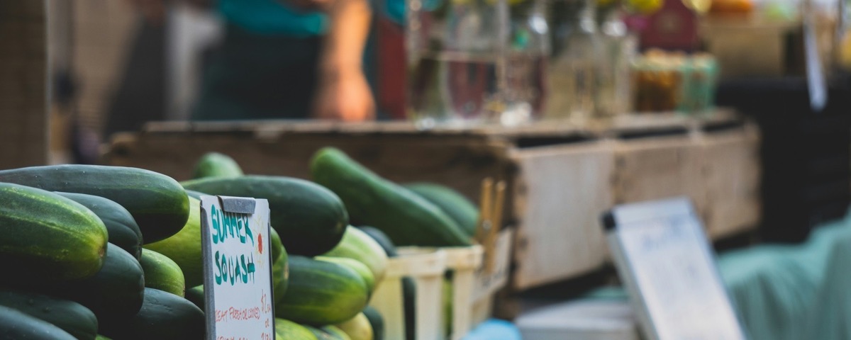 Fresh vegetables displayed at a farmers' market.